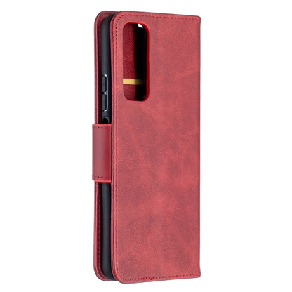 Red leather phone wallet case with raised camera cutout and side card slot