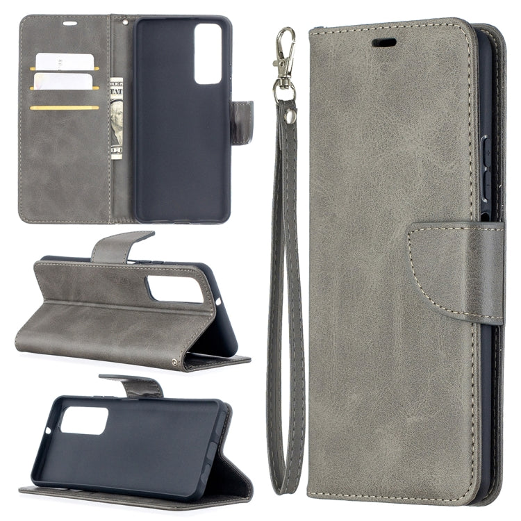 Grey leather wallet phone case with flip cover, card slots, and wrist lanyard strap
