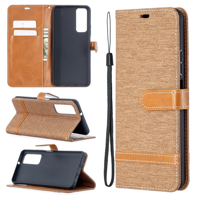Brown denim-texture phone wallet case with flip cover, card slots, and wrist strap