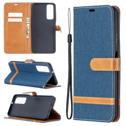Blue denim-texture phone wallet case with flip cover, card slots, and wrist strap
