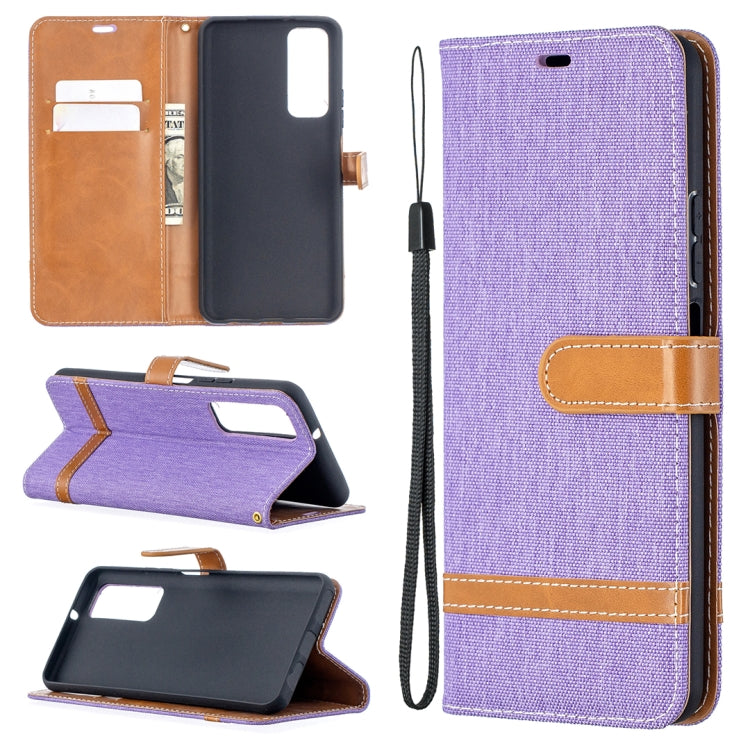 Purple denim-texture phone wallet case with flip cover, card slots, and wrist strap