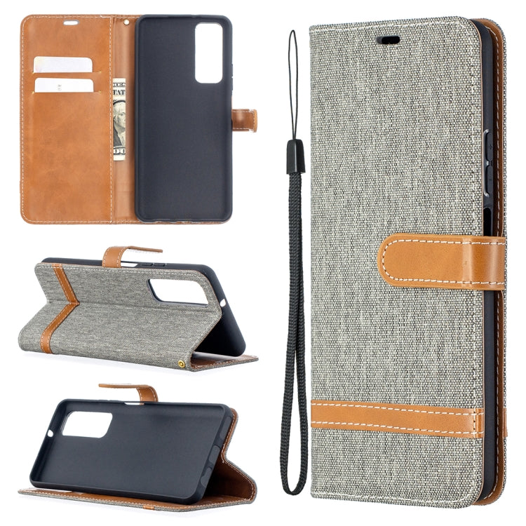 Grey denim wallet phone case with leather card holder, flip cover, wrist lanyard