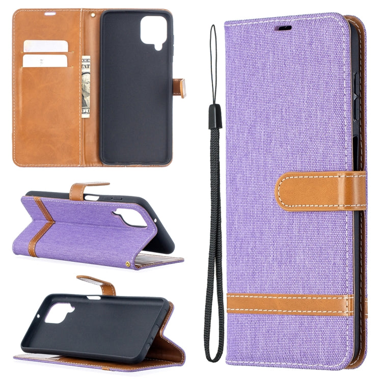 Purple denim-texture phone wallet case with flip cover, card slots, and wrist strap