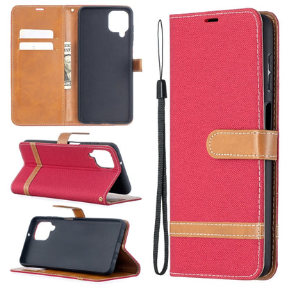 Red denim-texture phone wallet case with flip cover, card slots, and wrist strap