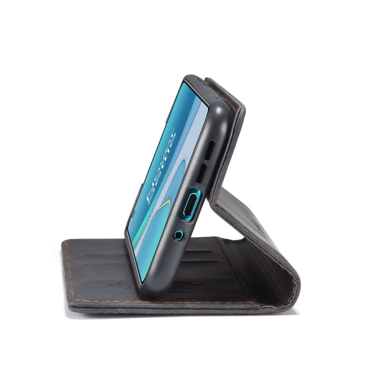 Leather wallet case on its side as a stand, dark finish with stitched trim and cutouts