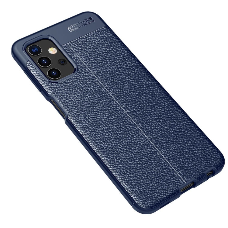 Blue litchi-texture TPU phone case, diagonal view, with triple camera cutout