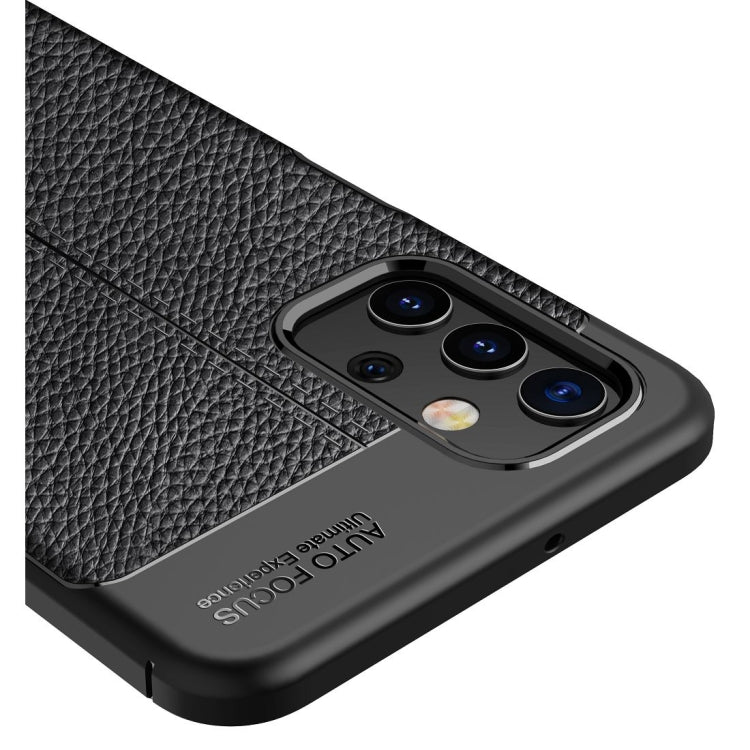 Black litchi-texture TPU phone case close-up of triple camera module and accents