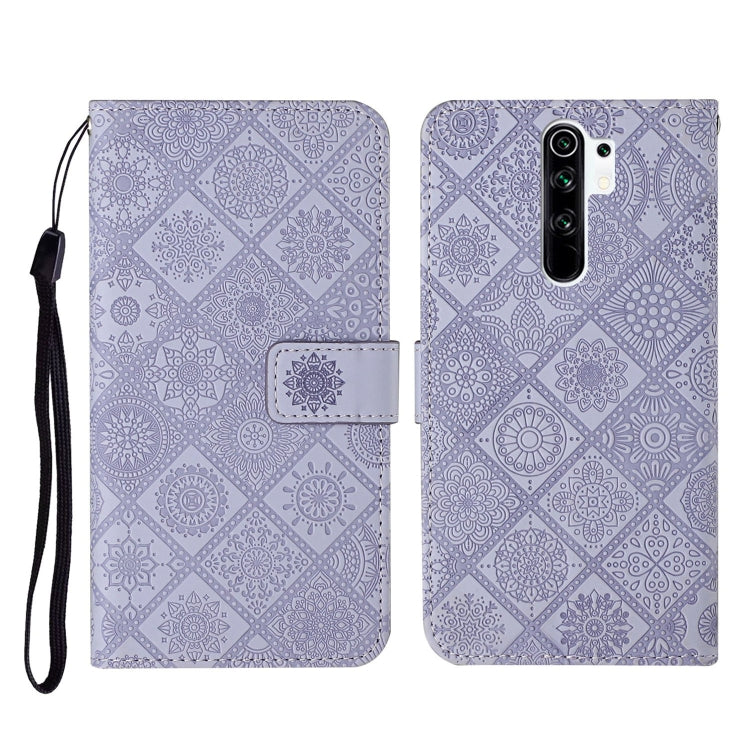 Purple embossed flip leather phone case with card holder and black wrist strap