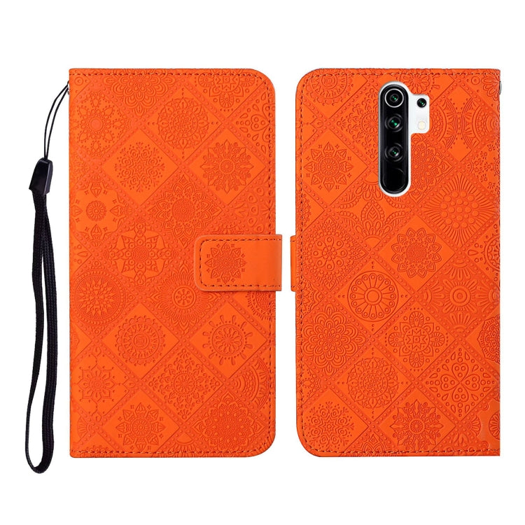 Orange embossed flip leather phone case with card holder and black wrist strap
