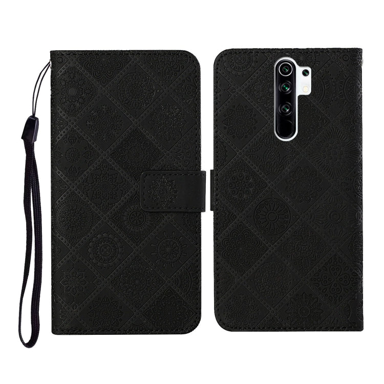 Black embossed flip leather phone case with card holder and black wrist strap