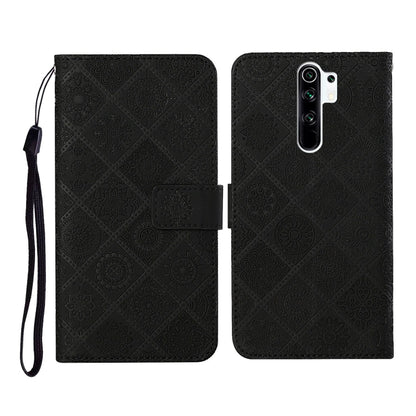 Black embossed flip leather phone case with card holder and black wrist strap
