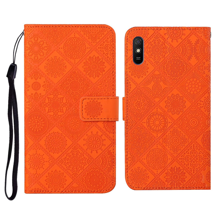 Orange embossed flip leather phone case with card holder and black wrist strap