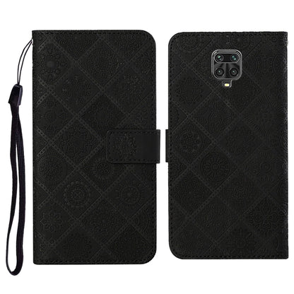 Black embossed flip leather wallet phone case with card slots and wrist lanyard