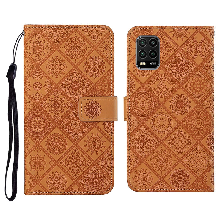 Orange embossed flip leather wallet phone case with card slots and wrist lanyard