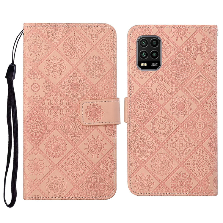 Pink embossed flip phone wallet case with card holder and wrist lanyard strap