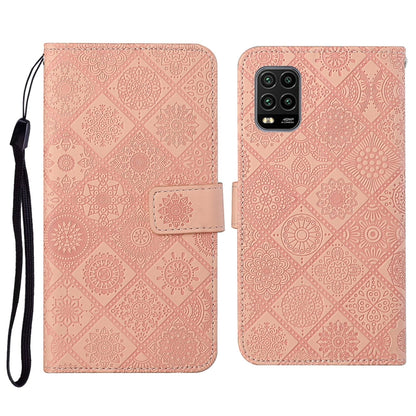 Pink embossed flip phone wallet case with card holder and wrist lanyard strap