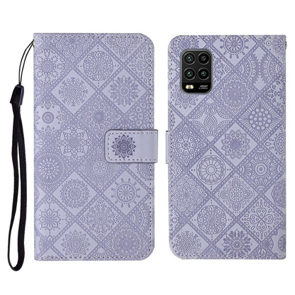 Lavender embossed flip phone wallet case with card holder and wrist lanyard strap