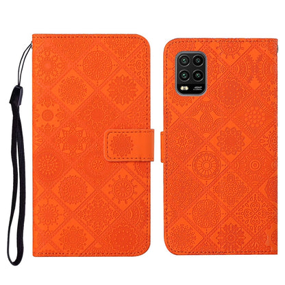 Orange embossed flip phone wallet case with card holder and wrist lanyard strap