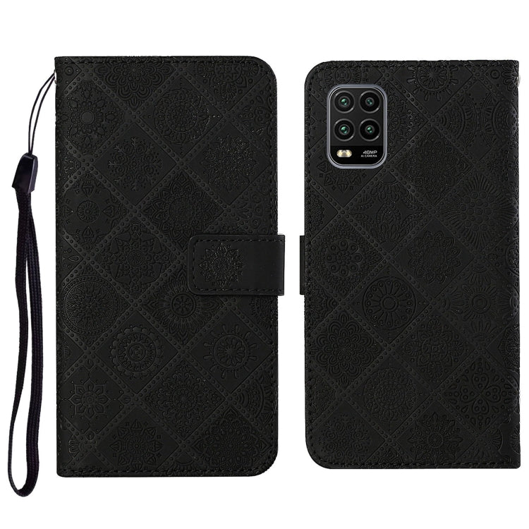 Black embossed flip phone wallet case with card holder and wrist lanyard strap