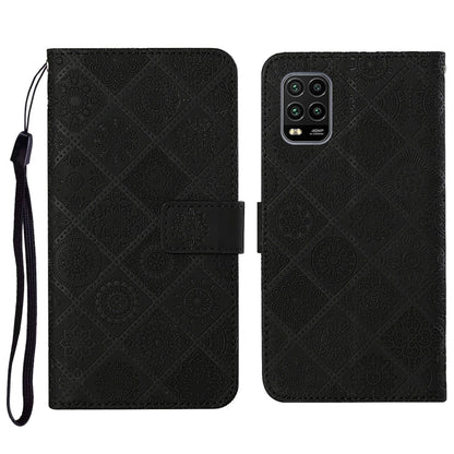 Black embossed flip phone wallet case with card holder and wrist lanyard strap