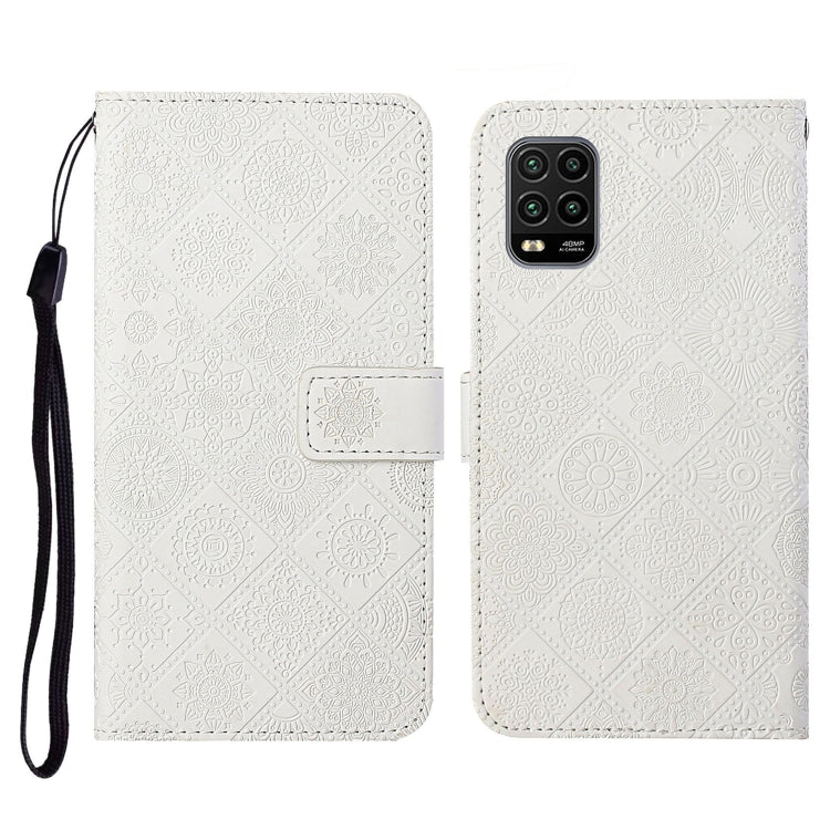 White embossed flip phone wallet case with card holder and wrist lanyard strap