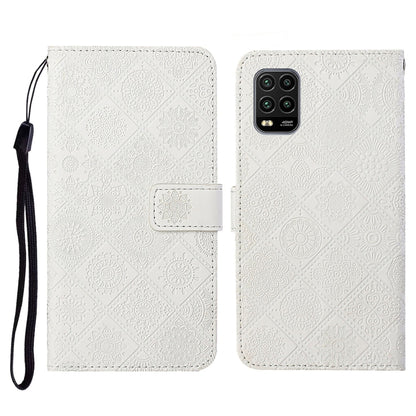 White embossed flip phone wallet case with card holder and wrist lanyard strap