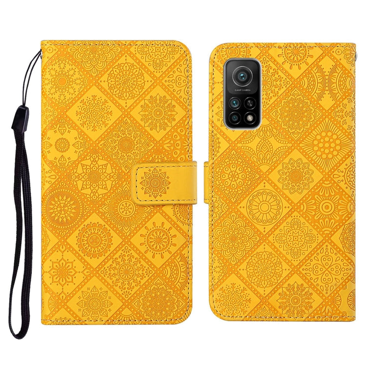 Mustard yellow embossed flip phone wallet case with card slots and wrist lanyard strap