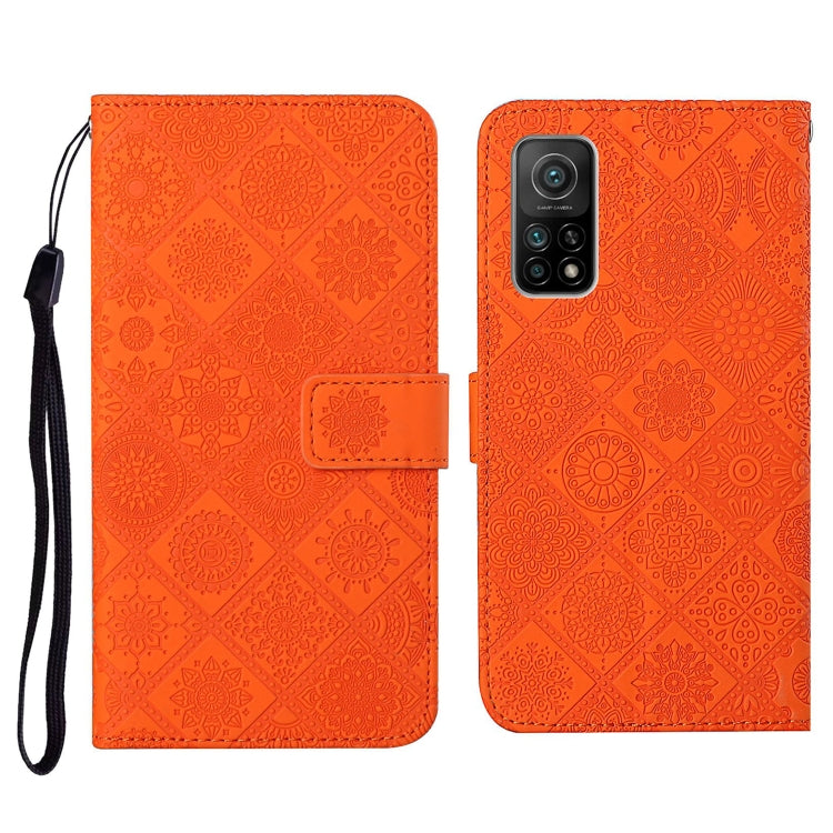 Embossed flip leather phone wallet case with card slot, holder, and wrist strap; orange