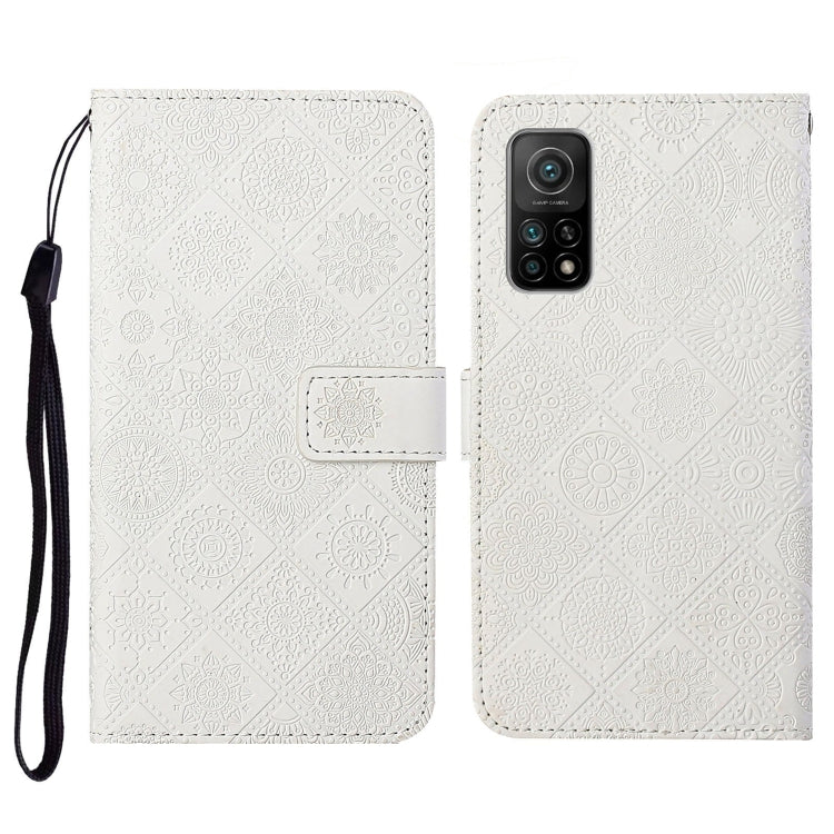Embossed flip leather phone wallet case with card slot and wrist strap; white