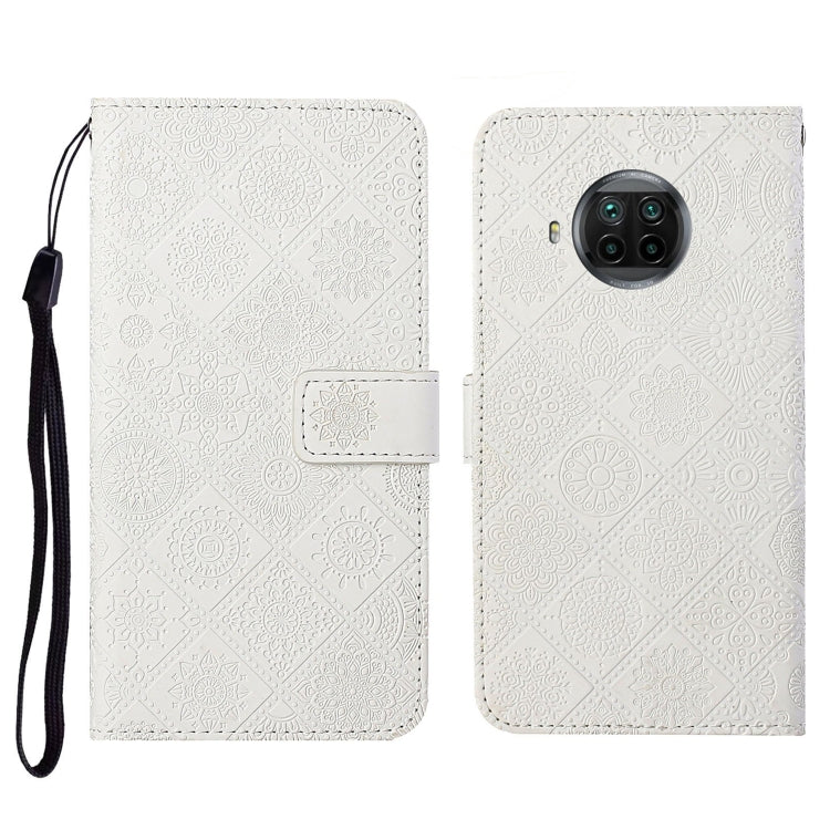 Embossed flip leather phone wallet case with card slot and wrist strap; off-white