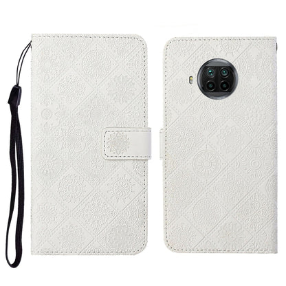 Embossed flip leather phone wallet case with card slot and wrist strap; off-white