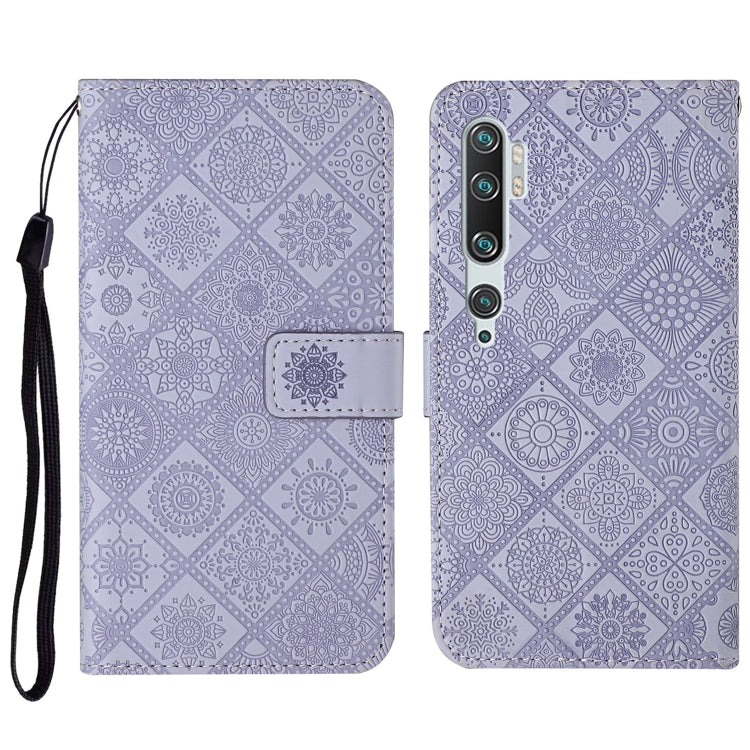 Purple embossed flip leather phone wallet case with card slots and lanyard strap