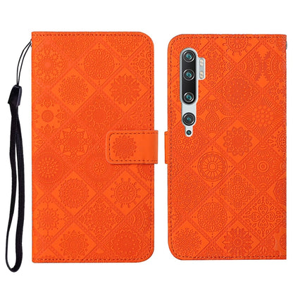 Orange embossed flip leather phone wallet case with card slots and lanyard strap
