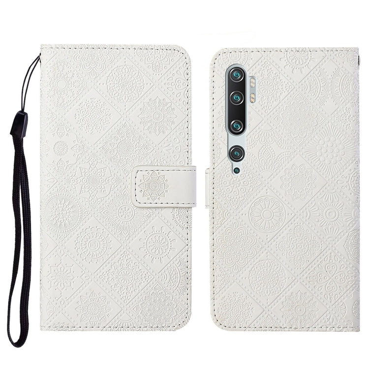 White embossed flip leather phone wallet case with card slots and lanyard strap