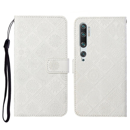 White embossed flip leather phone wallet case with card slots and lanyard strap