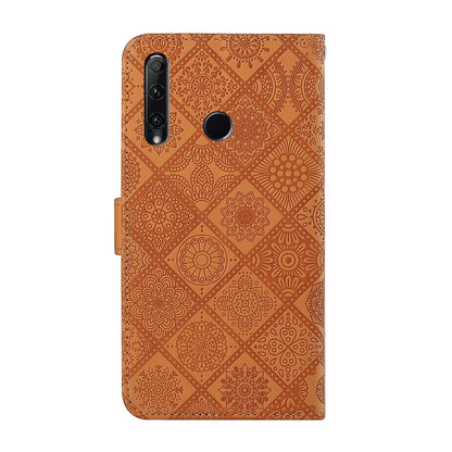 Brown embossed leather flip phone case with camera cutouts and fold-over wallet strap