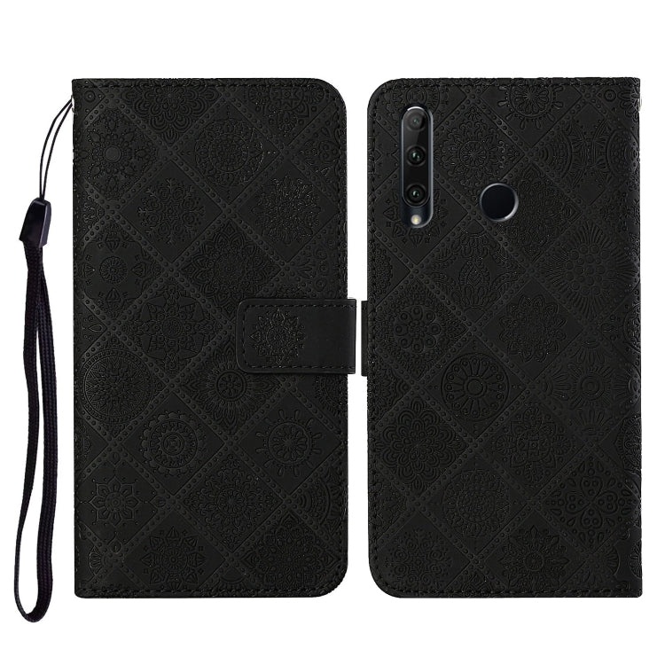 Black embossed folio leather phone case with flip cover, card slot, and wrist strap