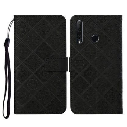 Black embossed folio leather phone case with flip cover, card slot, and wrist strap