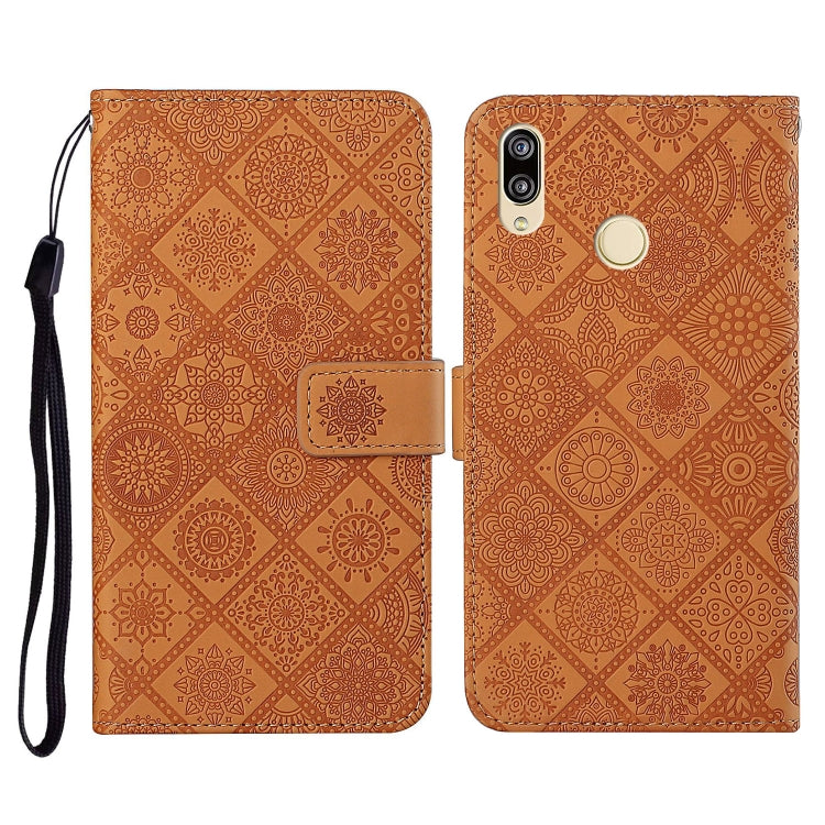 Brown embossed folio leather phone case with flip cover, card slot, and wrist strap