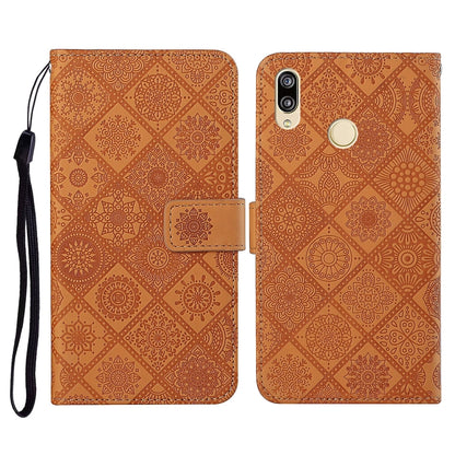 Brown embossed folio leather phone case with flip cover, card slot, and wrist strap
