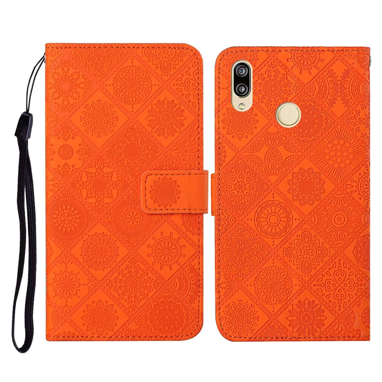 Orange embossed folio leather phone case with flip cover, card slot, and wrist strap