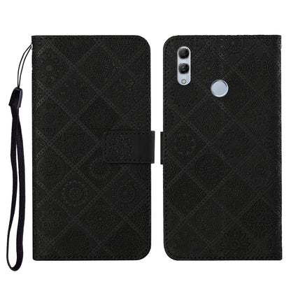 Black embossed flip leather phone case with card holder, lanyard strap, and camera cutout