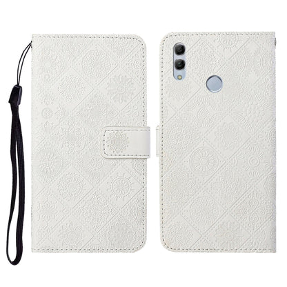 White embossed flip leather phone case with card holder, lanyard strap, and camera cutout