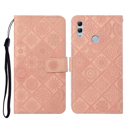 Pink embossed flip leather phone wallet case with card slots and lanyard strap