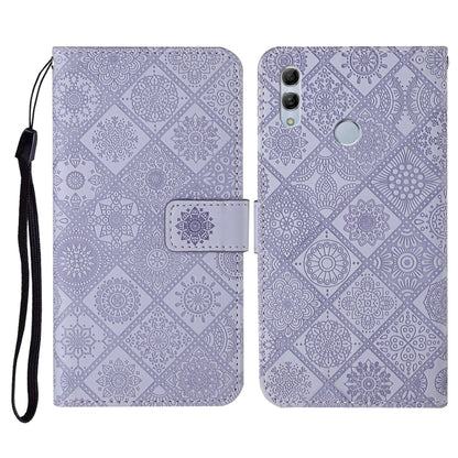 Purple embossed flip phone wallet case with wrist strap and card holder slot