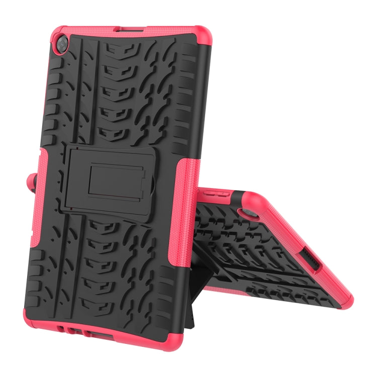 Pink rugged tablet case with textured back, stand, and port cutouts