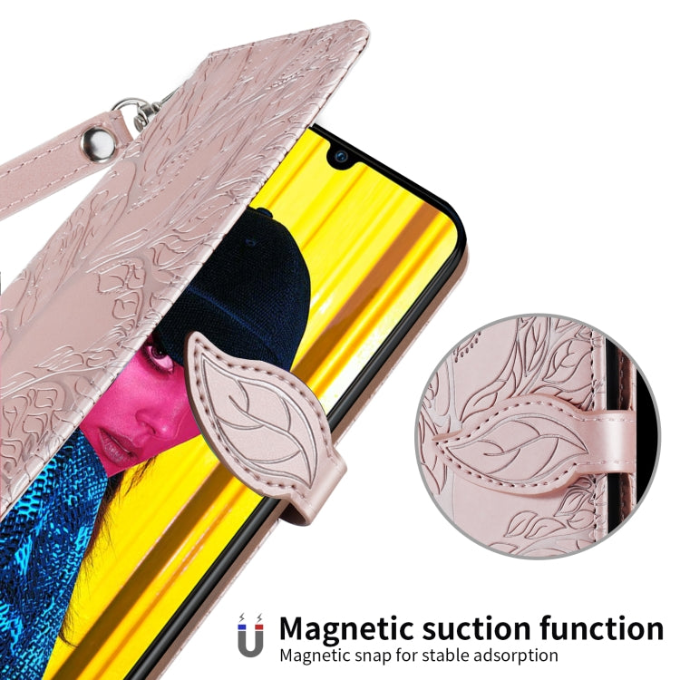 Rose gold embossed flip case with magnetic snap closure and wrist strap