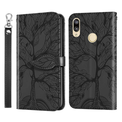 Black embossed leaf-pattern flip leather phone case with lanyard strap and gold circle