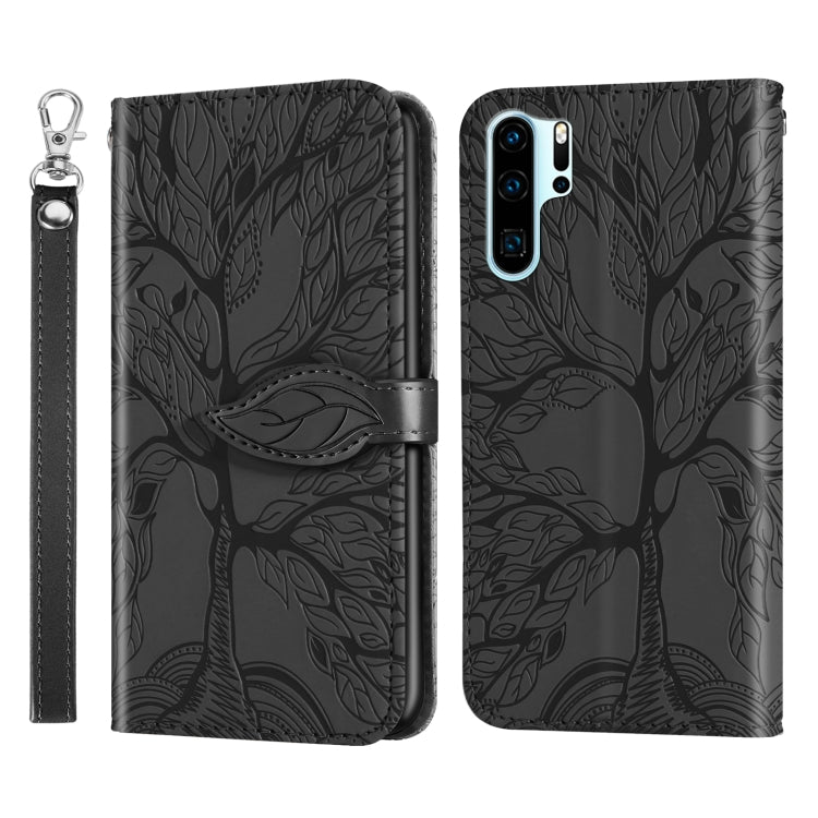 Black embossed leaf-pattern flip leather phone case with lanyard strap and blue camera trim