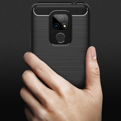 Black brushed TPU phone case on hand, showing camera cutout and texture